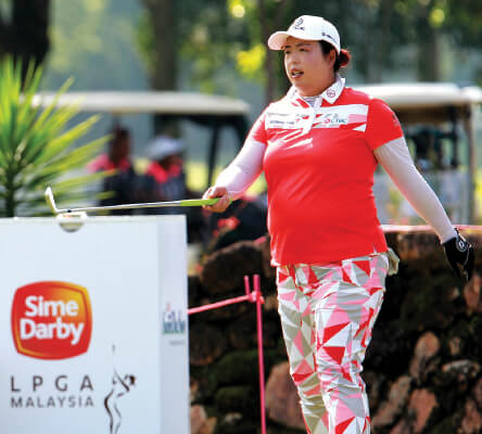 Defending champ Feng leads in Malaysia Defending champ Feng leads in Malaysia